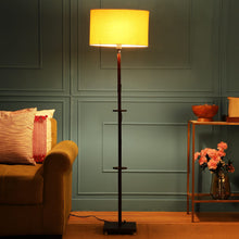 ORLANDO FLOOR LAMP WITH YELLOW SHADE IN OVAL SHAPE AND WALNUT POLISH BASE IN SOLID WOOD